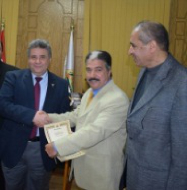 Benha University honors Mr. Ayman Tawfik, the head of the graduates affairs department in the faculty